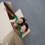 My boys in a cardboard box